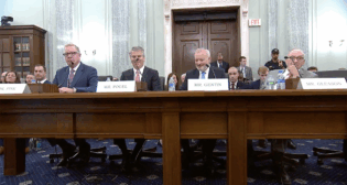 David Armstrong Fink (far left) and Robert A. Gleason Jr. (far right) were among those testifying at a nominations hearing for their potential positions at FRA (Fink) and Amtrak (Gleason). (Screen grab from a Senate Committee on Commerce, Science, and Transportation Video)